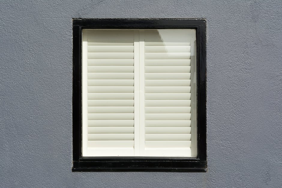 White wooden plantation shutters installed in a modern home