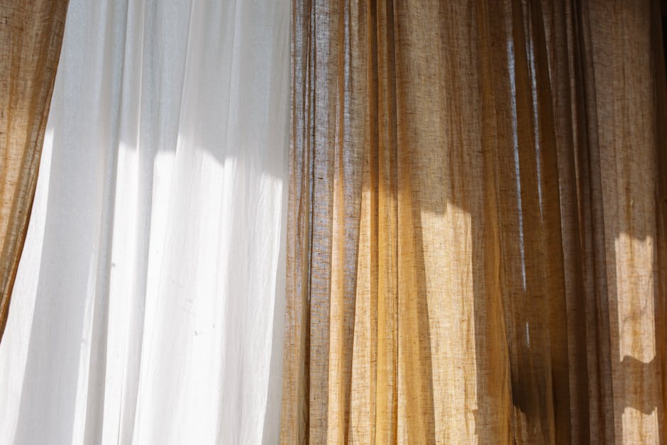 Fabric roman window shades providing soft light filtering